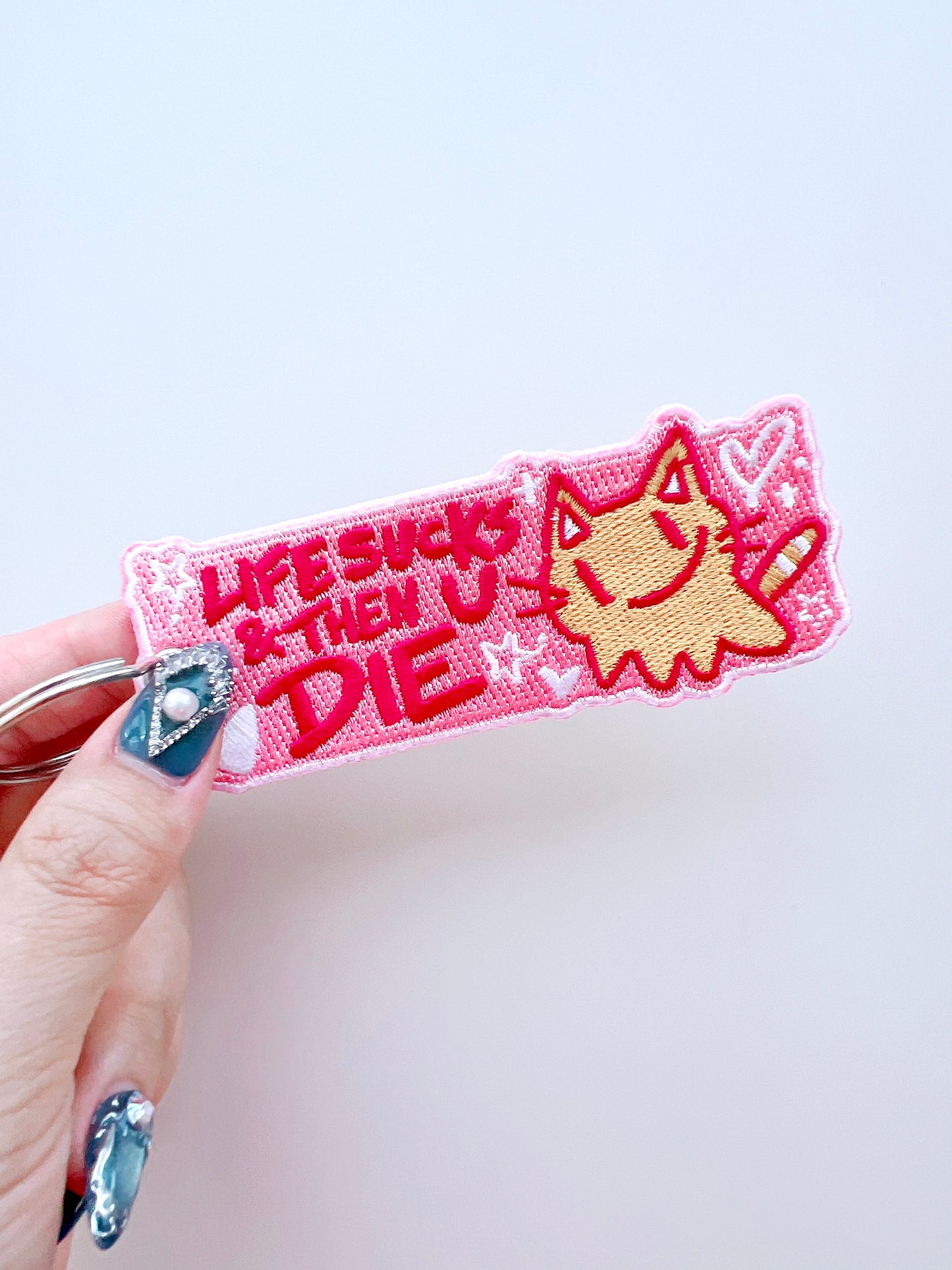 Life Sucks Embroidered Jet Tag